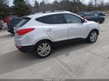 2012 Hyundai Tucson — photo 4 of 11 | VIN KM8JUCAC0CU372353