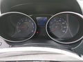 2012 Hyundai Tucson — photo 7 of 11 | VIN KM8JUCAC0CU372353