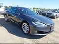 2016 Tesla Model S — photo 1 of 18 | VIN 5YJSA1E13GF161127