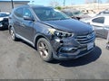 2018 Hyundai Santa Fe — photo 6 of 16 | VIN 5XYZU3LB7JG506365