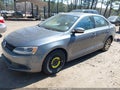 2014 Volkswagen Jetta — photo 2 of 12 | VIN 3VWB07AJ5EM440886