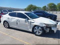 2016 Kia Optima Hybrid — photo 6 of 19 | VIN KNAGN4ADXG5093810