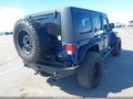2010 Jeep Wrangler Unlimited — photo 4 of 16 | VIN 1J4BA5H15AL196477