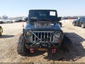 2012 Jeep Wrangler Unlimited — photo 11 of 15 | VIN 1C4BJWDG7CL259443
