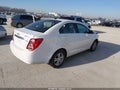 2014 Chevrolet Sonic — photo 4 of 17 | VIN 1G1JC5SB0E4222909