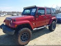 2011 Jeep Wrangler Unlimited — photo 2 of 16 | VIN 1J4HA5H12BL543355