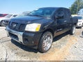 2007 Nissan Titan — photo 2 of 15 | VIN 1N6BA07B57N240250