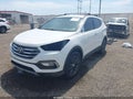 2018 Hyundai Santa Fe — photo 2 of 15 | VIN 5XYZU4LA0JG542279