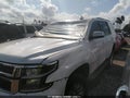 2018 Chevrolet Tahoe — photo 2 of 11 | VIN 1GNSCAKC4JR254912
