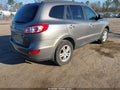 2012 Hyundai Santa Fe — photo 4 of 11 | VIN 5XYZG3AB5CG158837