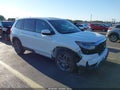 2023 Honda Passport — photo 1 of 16 | VIN 5FNYF8H53PB023638