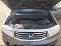 2013 Honda Pilot — photo 6 of 16 | VIN 5FNYF4H56DB014677