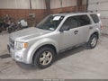 2010 Ford Escape — photo 2 of 11 | VIN 1FMCU9D71AKD41843