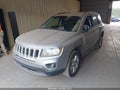 2014 Jeep Compass — photo 2 of 10 | VIN 1C4NJCBBXED893667