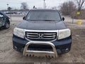 2012 Honda Pilot — photo 12 of 16 | VIN 5FNYF4H65CB018517