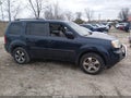 2012 Honda Pilot — photo 13 of 16 | VIN 5FNYF4H65CB018517