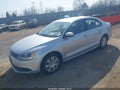 2012 Volkswagen Jetta — photo 2 of 11 | VIN 3VWDX7AJ7CM451700