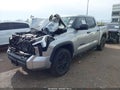 2023 Toyota Tundra — photo 2 of 16 | VIN 5TFLA5DB5PX095546
