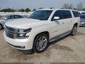 2015 Chevrolet Suburban 1500 — photo 2 of 15 | VIN 1GNSKKKC5FR131345