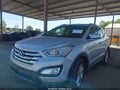 2014 Hyundai Santa Fe — photo 2 of 16 | VIN 5XYZU3LA7EG221064