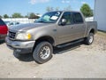 2001 Ford F-150 — photo 2 of 12 | VIN 1FTRW08L91KE93414