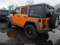 2012 Jeep Wrangler Unlimited — photo 3 of 16 | VIN 1C4BJWDG9CL181876