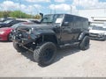 2017 Jeep Wrangler Unlimited — photo 2 of 16 | VIN 1C4BJWDG8HL567051