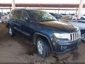 2012 Jeep Grand Cherokee — photo 1 of 10 | VIN 1C4RJFAG6CC249943