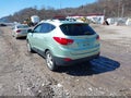 2012 Hyundai Tucson — photo 3 of 11 | VIN KM8JUCAC9CU347144