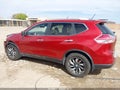 2014 Nissan Rogue — photo 15 of 17 | VIN 5N1AT2MT0EC785553