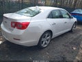 2015 Chevrolet Malibu — photo 4 of 16 | VIN 1G11G5SX8FF281650