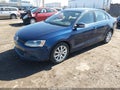2014 Volkswagen Jetta — photo 2 of 19 | VIN 3VWD17AJ4EM442036