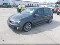 2014 Volkswagen GTI — photo 2 of 16 | VIN WVWHD7AJ5EW004377