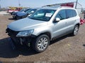 2009 Volkswagen Tiguan — photo 2 of 19 | VIN WVGAV75N29W530575