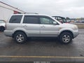 2007 Honda Pilot — photo 13 of 16 | VIN 2HKYF18477H525889