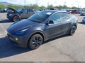 2024 Tesla Model Y — photo 2 of 15 | VIN 7SAYGDED5RF208894
