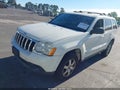 2010 Jeep Grand Cherokee — photo 2 of 13 | VIN 1J4PR4GK8AC103227