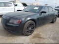 2013 Chrysler 300 — photo 2 of 11 | VIN 2C3CCAAGXDH660851