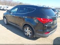 2013 Hyundai Santa Fe — photo 3 of 11 | VIN 5XYZU3LA5DG083989