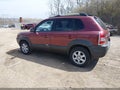 2005 Hyundai Tucson — photo 3 of 13 | VIN KM8JN72D25U103088