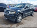 2011 Jeep Grand Cherokee — photo 2 of 12 | VIN 1J4RS4GG1BC597151