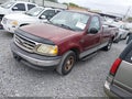 2003 Ford F-150 — photo 2 of 15 | VIN 1FTRF17W53NA51037