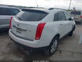 2013 Cadillac SRX — photo 4 of 11 | VIN 3GYFNAE39DS650460