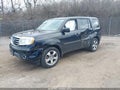 2013 Honda Pilot — photo 2 of 17 | VIN 5FNYF4H57DB064004