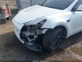 2022 Tesla Model Y — photo 6 of 20 | VIN 7SAYGAEE7NF361486