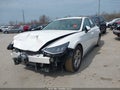 2022 Hyundai Sonata — photo 2 of 16 | VIN 5NPEG4JA3NH143521