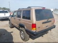 1999 Jeep Cherokee — photo 3 of 12 | VIN 1J4FF28S3XL557546