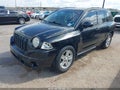 2009 Jeep Compass — photo 2 of 12 | VIN 1J4FT47B99D137549
