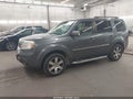 2012 Honda Pilot — photo 2 of 17 | VIN 5FNYF4H94CB024092