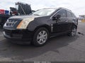 2011 Cadillac SRX — photo 2 of 16 | VIN 3GYFNGEY1BS610837
